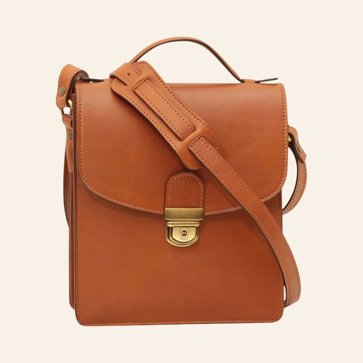 Borsa a tracolla Vetrina Fiorentina in pelle di vitello color coloniale con chiusura a clip e tracolla regolabile