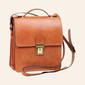 Borsa a tracolla Vetrina Fiorentina in pelle di vitello color coloniale con chiusura a clip e tracolla regolabile