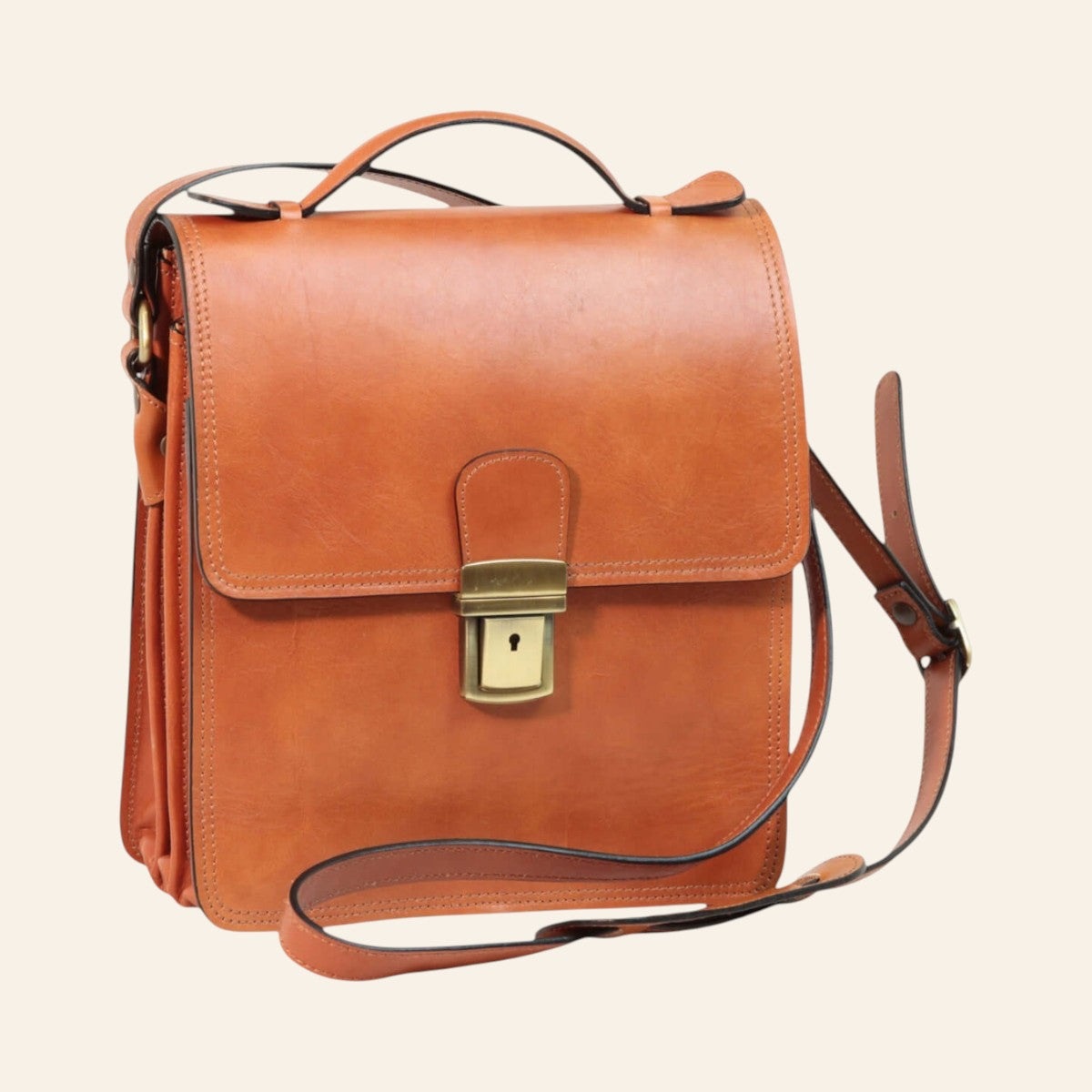 Borsa a tracolla Vetrina Fiorentina in pelle di vitello color coloniale con chiusura a clip e tracolla regolabile