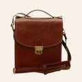 Borsa a tracolla Vetrina Fiorentina in pelle di vitello marrone artigianale con chiusura a clip e tracolla regolabile