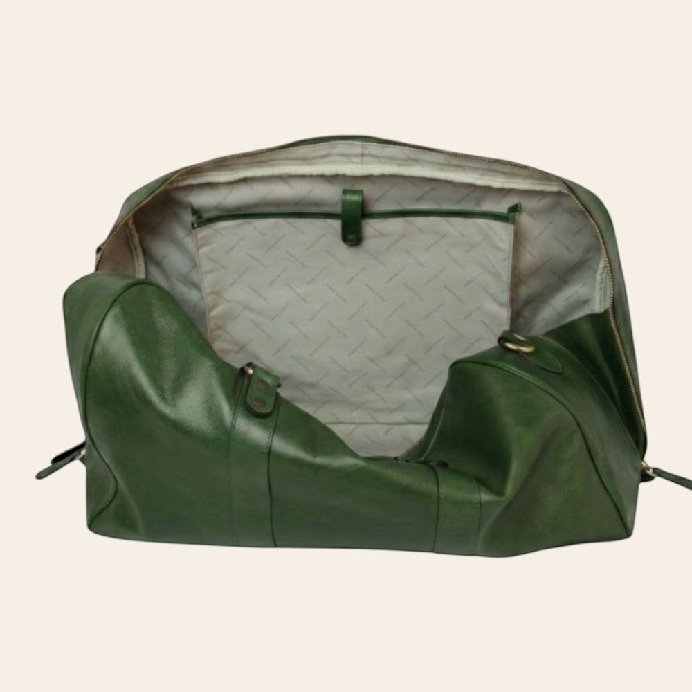 Interno del borsone da viaggio Vetrina Fiorentina in pelle verde con scomparto per laptop e fodera logata Made in Italy