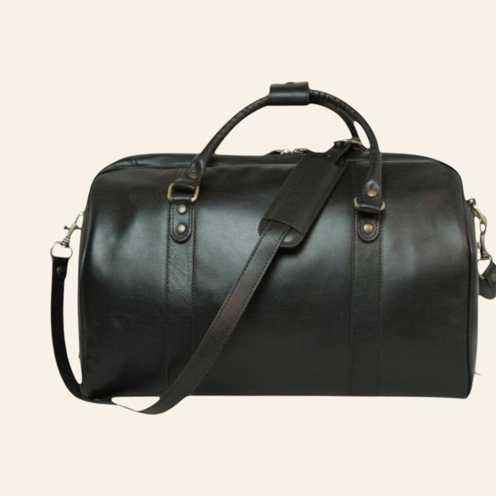 Bolsa de viaje de piel negra, vista frontal con asas dobles y correa extraíble