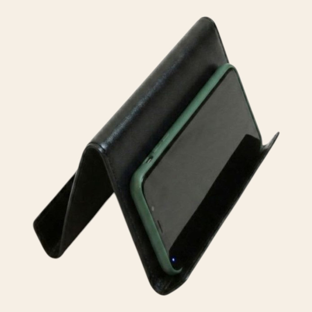 Supporto per smartphone Vetrina Fiorentina in pelle di vitello nera artigianale, ideale per scrivania.
